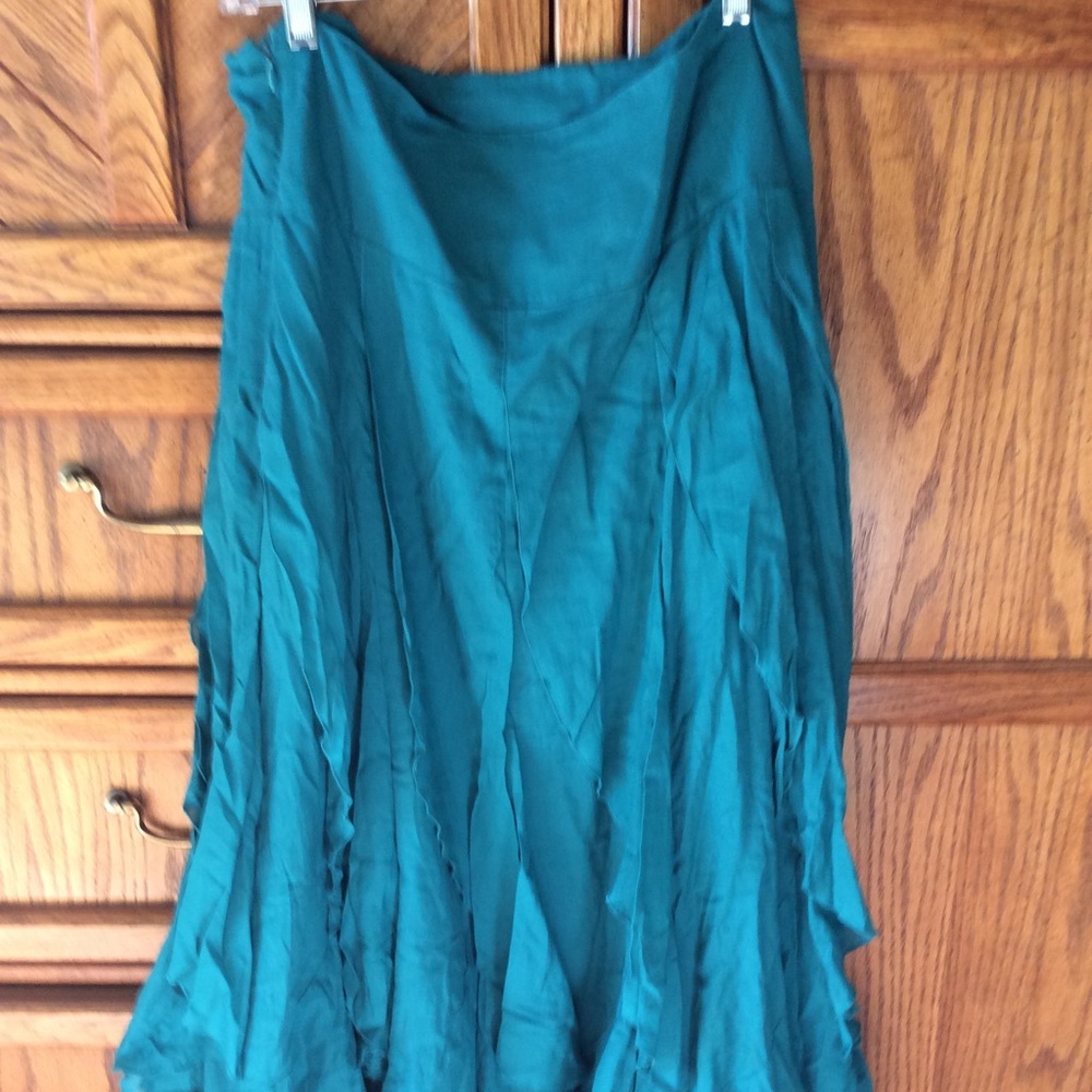 Flirty turquoise skirt w/ ruffles.